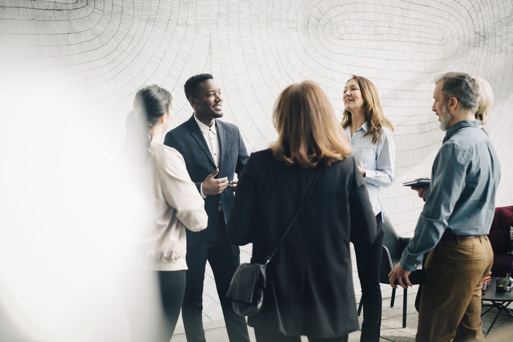 A group of professionals in conversation